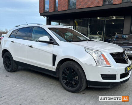 Білий Каділак SRX, об'ємом двигуна 3.5 л та пробігом 230 тис. км за 12000 $, фото 1 на Automoto.ua
