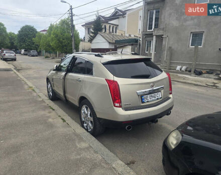 Бежевий Каділак SRX, об'ємом двигуна 3 л та пробігом 248 тис. км за 11499 $, фото 3 на Automoto.ua