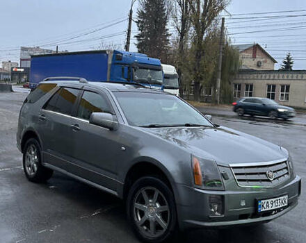 Бежевий Каділак SRX, об'ємом двигуна 4.6 л та пробігом 340 тис. км за 5500 $, фото 1 на Automoto.ua