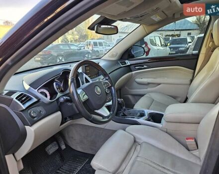Чорний Каділак SRX, об'ємом двигуна 2.99 л та пробігом 209 тис. км за 11900 $, фото 5 на Automoto.ua