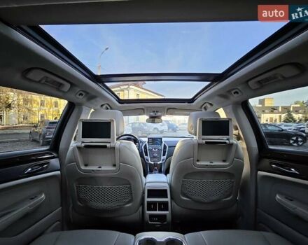 Чорний Каділак SRX, об'ємом двигуна 2.99 л та пробігом 209 тис. км за 11900 $, фото 8 на Automoto.ua