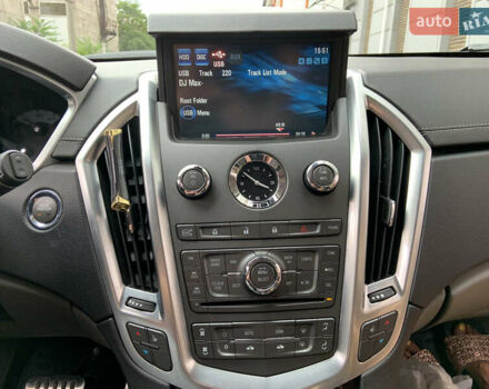 Чорний Каділак SRX, об'ємом двигуна 3 л та пробігом 144 тис. км за 11000 $, фото 8 на Automoto.ua