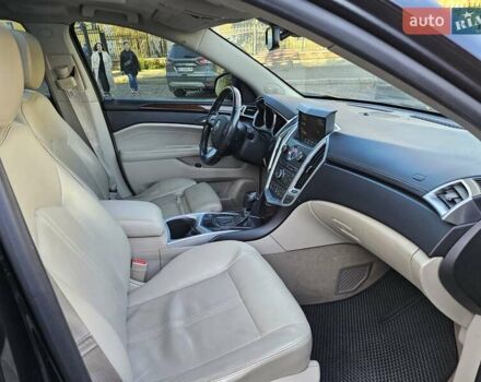 Чорний Каділак SRX, об'ємом двигуна 2.99 л та пробігом 209 тис. км за 11900 $, фото 7 на Automoto.ua