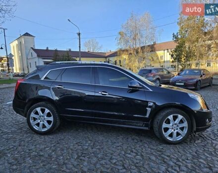 Чорний Каділак SRX, об'ємом двигуна 2.99 л та пробігом 209 тис. км за 11900 $, фото 4 на Automoto.ua