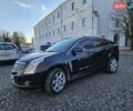 Чорний Каділак SRX, об'ємом двигуна 2.99 л та пробігом 209 тис. км за 11900 $, фото 1 на Automoto.ua
