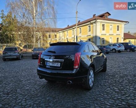 Чорний Каділак SRX, об'ємом двигуна 2.99 л та пробігом 209 тис. км за 11900 $, фото 3 на Automoto.ua
