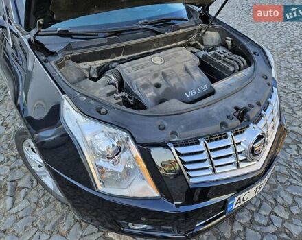 Чорний Каділак SRX, об'ємом двигуна 2.99 л та пробігом 209 тис. км за 11900 $, фото 14 на Automoto.ua