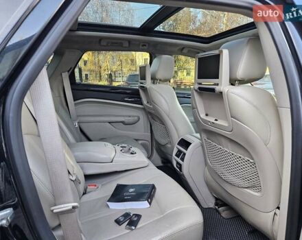 Чорний Каділак SRX, об'ємом двигуна 2.99 л та пробігом 209 тис. км за 11900 $, фото 9 на Automoto.ua