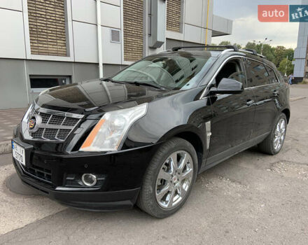 Чорний Каділак SRX, об'ємом двигуна 3 л та пробігом 144 тис. км за 11000 $, фото 12 на Automoto.ua