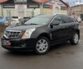 Чорний Каділак SRX, об'ємом двигуна 3 л та пробігом 195 тис. км за 10790 $, фото 1 на Automoto.ua