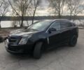 Чорний Каділак SRX, об'ємом двигуна 3 л та пробігом 390 тис. км за 9200 $, фото 1 на Automoto.ua