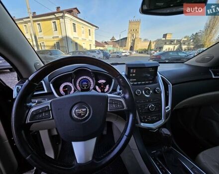 Чорний Каділак SRX, об'ємом двигуна 2.99 л та пробігом 209 тис. км за 11900 $, фото 6 на Automoto.ua