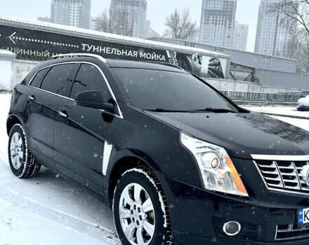 Чорний Каділак SRX, об'ємом двигуна 3.6 л та пробігом 192 тис. км за 12000 $, фото 2 на Automoto.ua