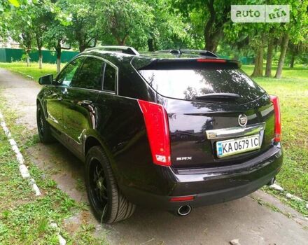 Чорний Каділак SRX, об'ємом двигуна 3.6 л та пробігом 170 тис. км за 15800 $, фото 19 на Automoto.ua