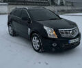 Чорний Каділак SRX, об'ємом двигуна 3.6 л та пробігом 192 тис. км за 12000 $, фото 1 на Automoto.ua