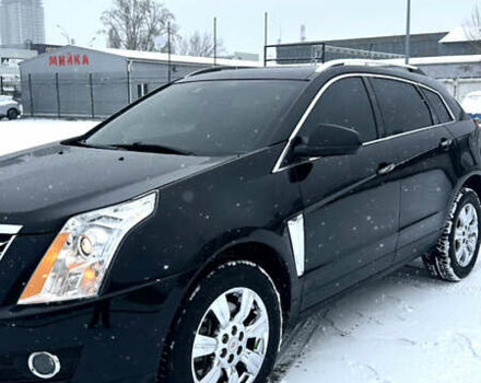 Чорний Каділак SRX, об'ємом двигуна 3.6 л та пробігом 192 тис. км за 12000 $, фото 7 на Automoto.ua