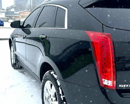Чорний Каділак SRX, об'ємом двигуна 3.6 л та пробігом 192 тис. км за 12000 $, фото 6 на Automoto.ua