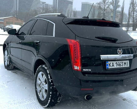 Чорний Каділак SRX, об'ємом двигуна 3.6 л та пробігом 192 тис. км за 12000 $, фото 5 на Automoto.ua