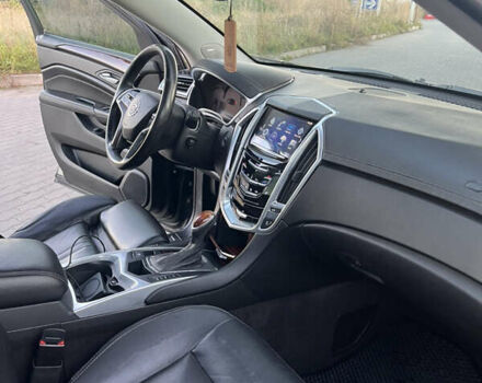 Черный Кадиллак СРХ, объемом двигателя 3.6 л и пробегом 210 тыс. км за 14500 $, фото 32 на Automoto.ua