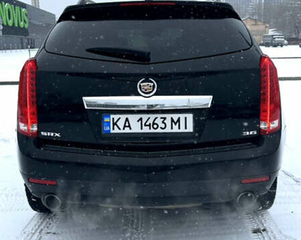 Чорний Каділак SRX, об'ємом двигуна 3.6 л та пробігом 192 тис. км за 12000 $, фото 4 на Automoto.ua