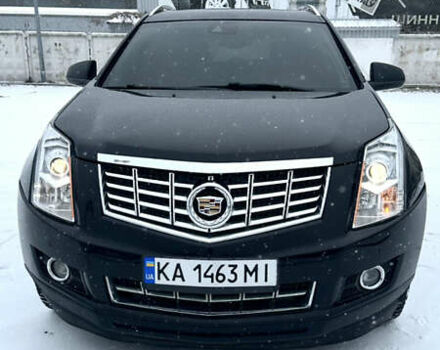 Чорний Каділак SRX, об'ємом двигуна 3.6 л та пробігом 192 тис. км за 12000 $, фото 1 на Automoto.ua