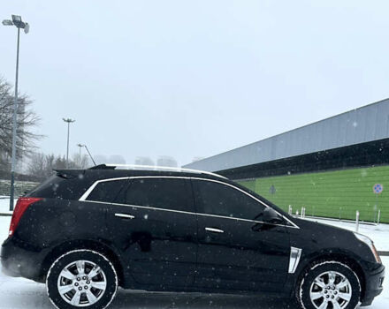 Чорний Каділак SRX, об'ємом двигуна 3.6 л та пробігом 192 тис. км за 12000 $, фото 3 на Automoto.ua
