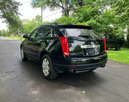 Чорний Каділак SRX, об'ємом двигуна 3.6 л та пробігом 64 тис. км за 3600 $, фото 4 на Automoto.ua