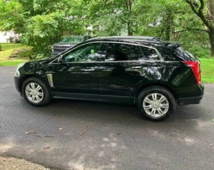 Чорний Каділак SRX, об'ємом двигуна 3.6 л та пробігом 64 тис. км за 3600 $, фото 5 на Automoto.ua