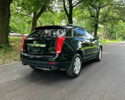 Чорний Каділак SRX, об'ємом двигуна 3.6 л та пробігом 64 тис. км за 3600 $, фото 2 на Automoto.ua