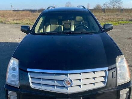 Черный Кадиллак СРХ, объемом двигателя 4.6 л и пробегом 320 тыс. км за 8000 $, фото 1 на Automoto.ua