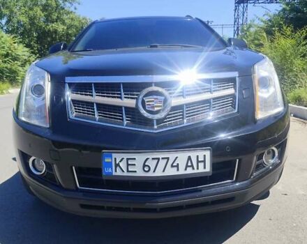 Чорний Каділак SRX, об'ємом двигуна 2.99 л та пробігом 260 тис. км за 10000 $, фото 1 на Automoto.ua
