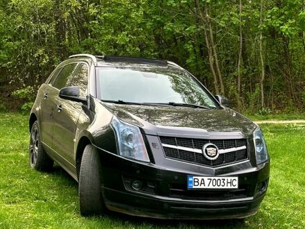 Чорний Каділак SRX, об'ємом двигуна 2.8 л та пробігом 274 тис. км за 12700 $, фото 1 на Automoto.ua