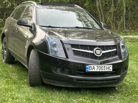 Чорний Каділак SRX, об'ємом двигуна 2.8 л та пробігом 274 тис. км за 12700 $, фото 1 на Automoto.ua