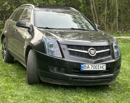 Чорний Каділак SRX, об'ємом двигуна 2.8 л та пробігом 274 тис. км за 12700 $, фото 1 на Automoto.ua