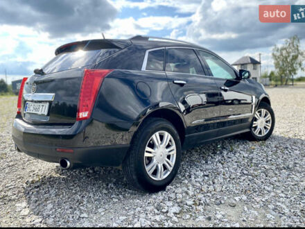 Каділак SRX 2010 у Львові на Automoto.ua Чорний Каділак SRX, об'ємом двигуна 3 л та пробігом 230 тис. км за 12000 $, фото 1 на Automoto.ua