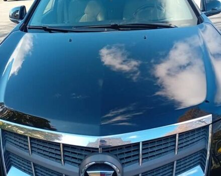 Чорний Каділак SRX, об'ємом двигуна 3 л та пробігом 140 тис. км за 15300 $, фото 1 на Automoto.ua