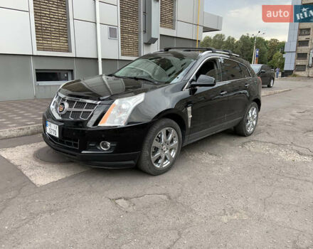 Черный Кадиллак СРХ, объемом двигателя 3 л и пробегом 144 тыс. км за 11000 $, фото 1 на Automoto.ua