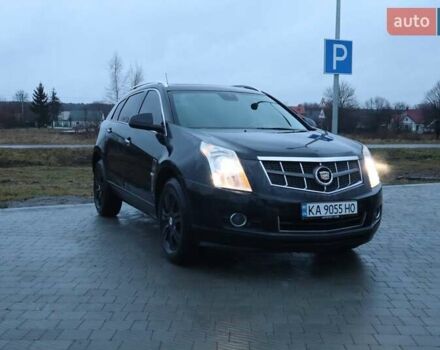 Чорний Каділак SRX, об'ємом двигуна 2.99 л та пробігом 256 тис. км за 8500 $, фото 1 на Automoto.ua