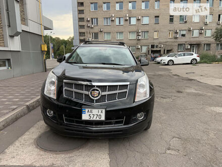Каділак SRX 2011 у Дніпро (Дніпропетровську) на Automoto.ua Чорний Каділак SRX, об'ємом двигуна 3 л та пробігом 130 тис. км за 14000 $, фото 1 на Automoto.ua