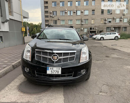 Черный Кадиллак СРХ, объемом двигателя 3 л и пробегом 130 тыс. км за 14500 $, фото 1 на Automoto.ua
