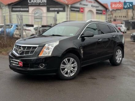 Каділак SRX 2011 у Вінниці на Automoto.ua Чорний Каділак SRX, об'ємом двигуна 3 л та пробігом 195 тис. км за 9990 $, фото 1 на Automoto.ua