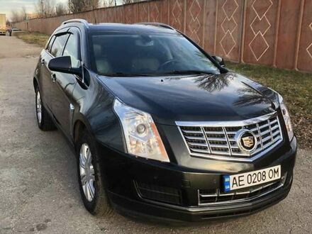 Чорний Каділак SRX, об'ємом двигуна 3.56 л та пробігом 190 тис. км за 14000 $, фото 1 на Automoto.ua