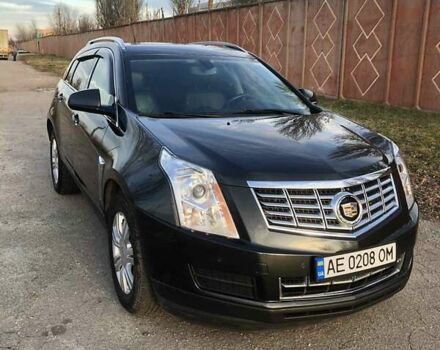 Чорний Каділак SRX, об'ємом двигуна 3.56 л та пробігом 190 тис. км за 14000 $, фото 1 на Automoto.ua