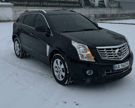 Чорний Каділак SRX, об'ємом двигуна 3.6 л та пробігом 192 тис. км за 12000 $, фото 1 на Automoto.ua