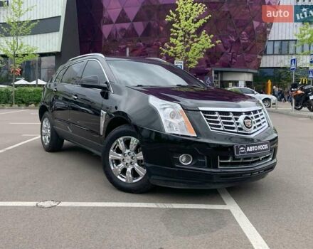 Чорний Каділак SRX, об'ємом двигуна 3.56 л та пробігом 186 тис. км за 11990 $, фото 1 на Automoto.ua