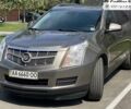 Коричневий Каділак SRX, об'ємом двигуна 3 л та пробігом 204 тис. км за 11000 $, фото 2 на Automoto.ua