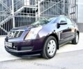 Коричневий Каділак SRX, об'ємом двигуна 3.6 л та пробігом 245 тис. км за 16500 $, фото 1 на Automoto.ua