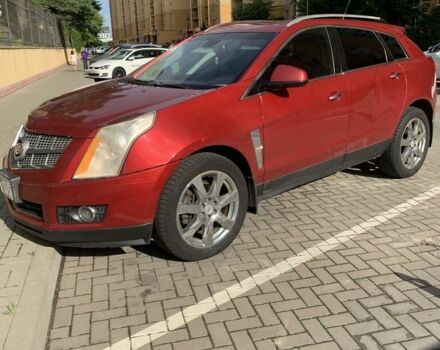 Червоний Каділак SRX, об'ємом двигуна 3 л та пробігом 260 тис. км за 10000 $, фото 1 на Automoto.ua