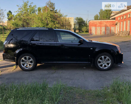 Каділак SRX, об'ємом двигуна 4.66 л та пробігом 130 тис. км за 9500 $, фото 3 на Automoto.ua