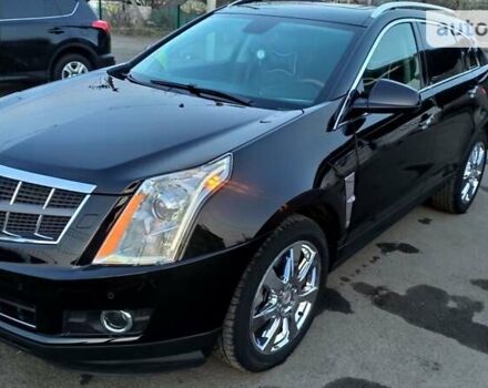 Каділак SRX, об'ємом двигуна 2.8 л та пробігом 151 тис. км за 13650 $, фото 1 на Automoto.ua